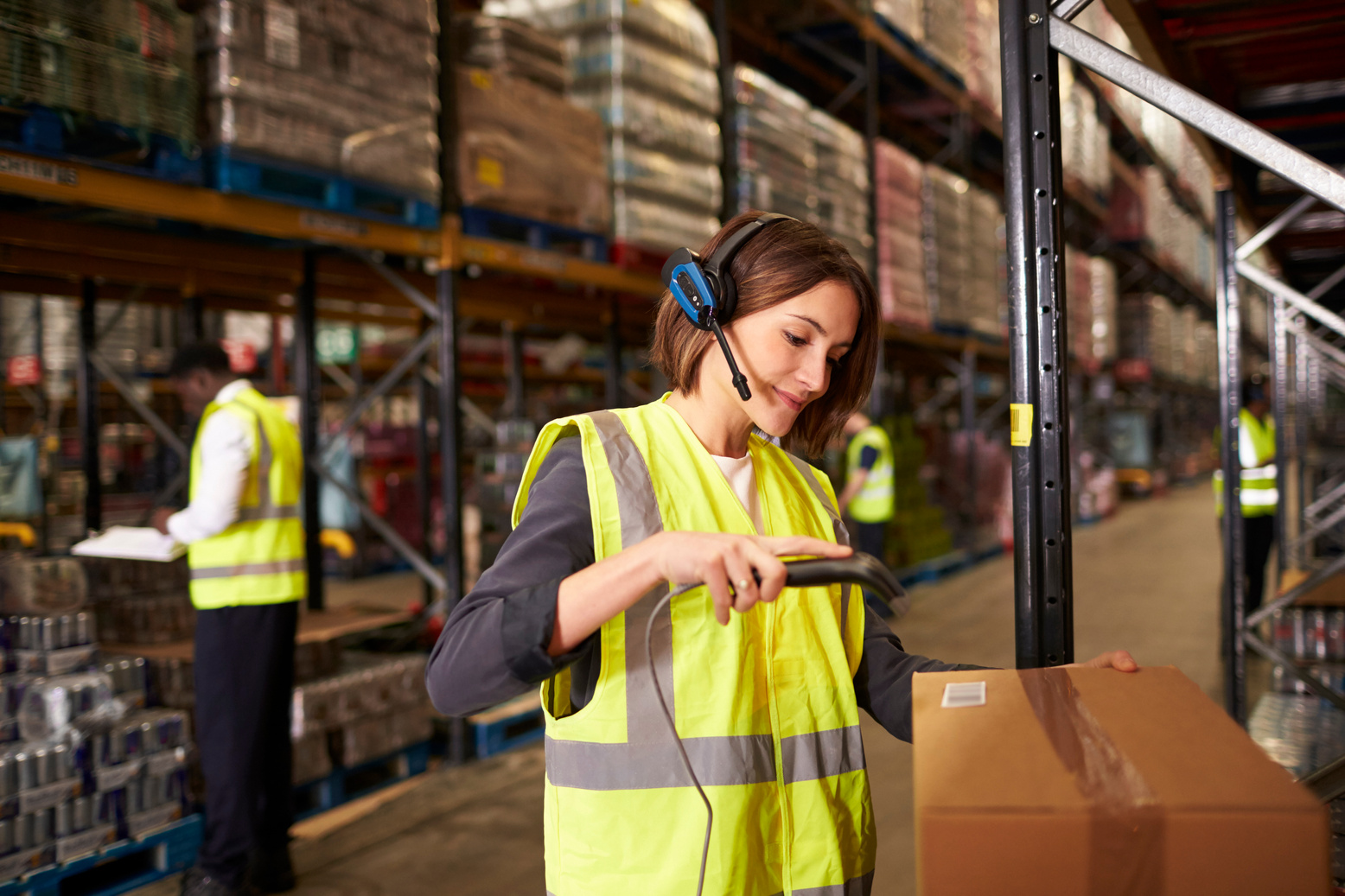 Woman Using a Barcode Reader 